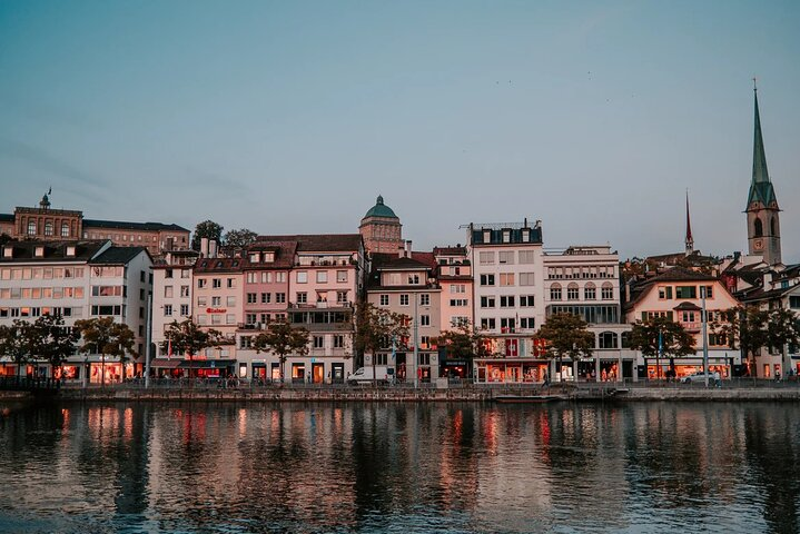 Experience the charm of Zurich as you cruise along the serene waters surrounded by stunning architecture and the inviting glow of riverside cafes. Ideal for a leisurely getaway with loved ones.