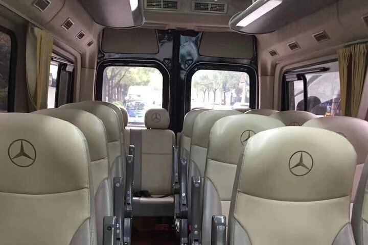 Comfortably seated in a spacious vehicle travelers will enjoy a smooth shared journey from Beijing Daxing Airport connecting seamlessly to iconic destinations like Wang Fu Jing and Guomao.