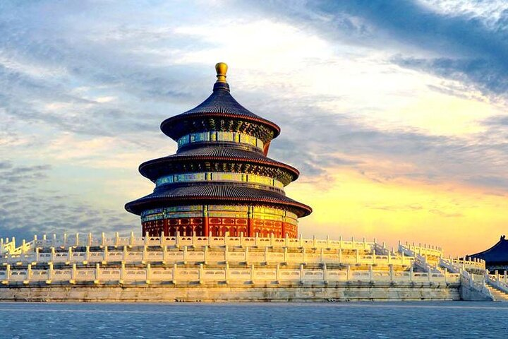 Experience the grandeur of the Temple of Heaven where ancient architecture meets serene gardens allowing exploration of rich histories and stunning scenery at your own pace.