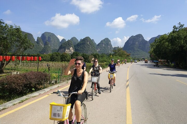 Full-day Tour: Cycling, Rafting & SanjieLiu Outdoor Water Theatre - Photo 1 of 18