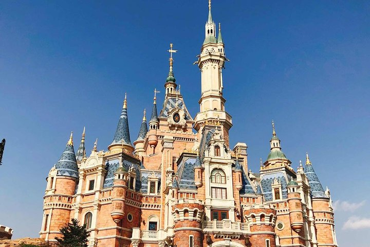 Experience seamless travel from your Shanghai accommodations to the magical world of Disneyland where a friendly driver ensures comfort and convenience making every moment memorable.