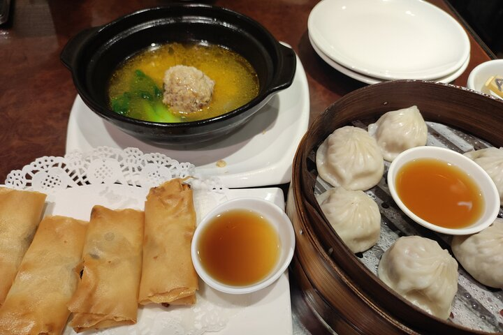 Immerse yourself in the ambiance of a century-old traditional Shanghai restaurant, where the most authentic xiaolongbao (soup dumplings) and an array of innovative noodle dishes await.