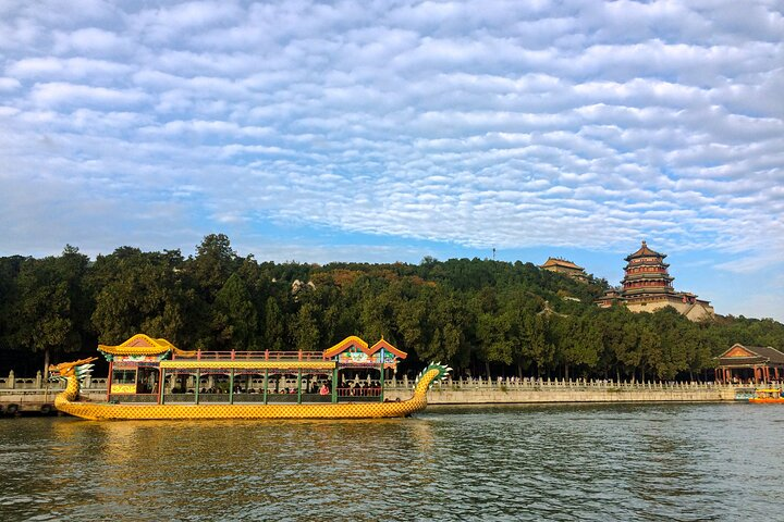 Experience the charm of Summer Palace as the serene waters reflect historic pavilions inviting leisurely boat rides amidst lush gardens and breathtaking views perfect for a memorable getaway.