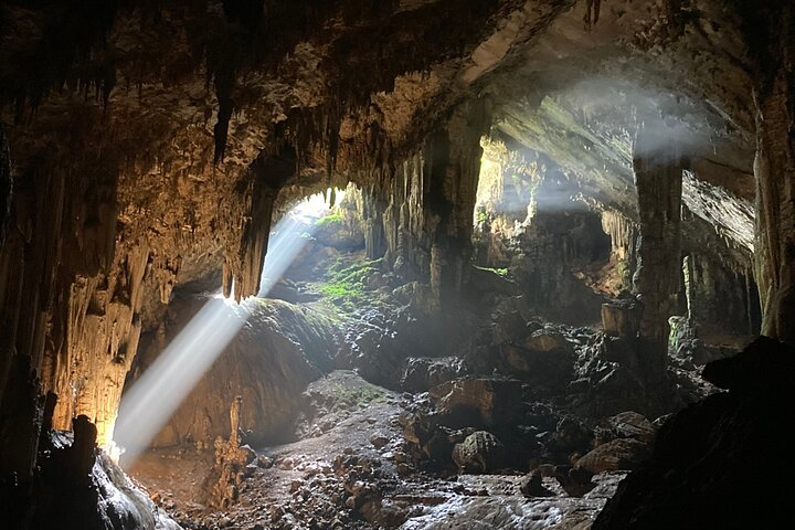 Visit 100% primitive cave with Transfer - Photo 1 of 9