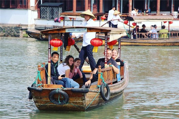 Experience the charm of Zhujiajiao Water Town as you glide through serene waters surrounded by traditional architecture and friendly faces all while creating unforgettable memories.
