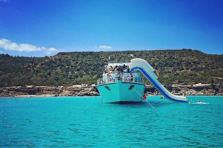 Blue Lagoon cruise: giant slide, music & Paphos hotel transfers - Photo 1 of 11