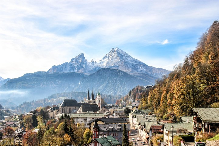 Experience the stunning beauty of Berchtesgaden where majestic mountains frame charming villages offering a glimpse into history and breathtaking views of the surrounding Alpine landscape.
