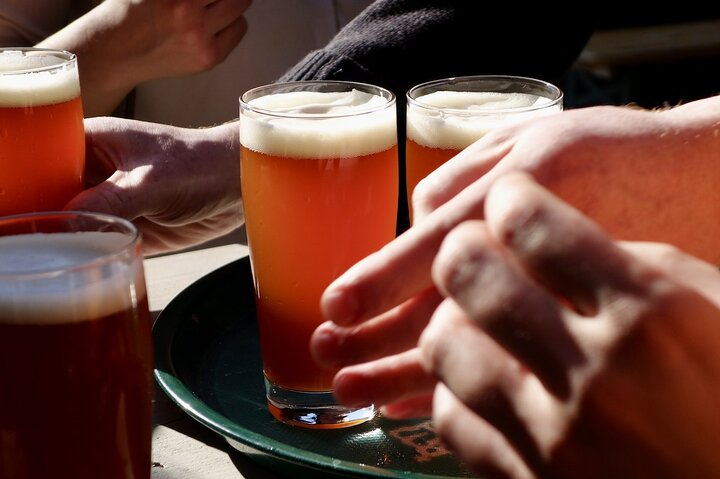 Explore Berlin's rich beer culture with local brews from microbreweries paired with homemade snacks. Enjoy the craft of brewing and unique street art on an unforgettable drinking adventure.