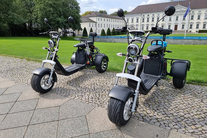 Experience the thrill of cruising through Berlin on an electric Harley Trike uncovering hidden gems and rich history with a friend by your side.