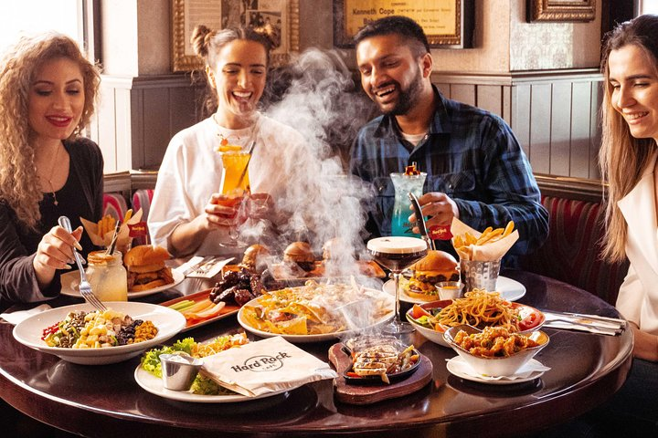 Experience the lively atmosphere of Hard Rock Cafe Munich where delicious meals and good company come together against a backdrop of unique decor and local charm.