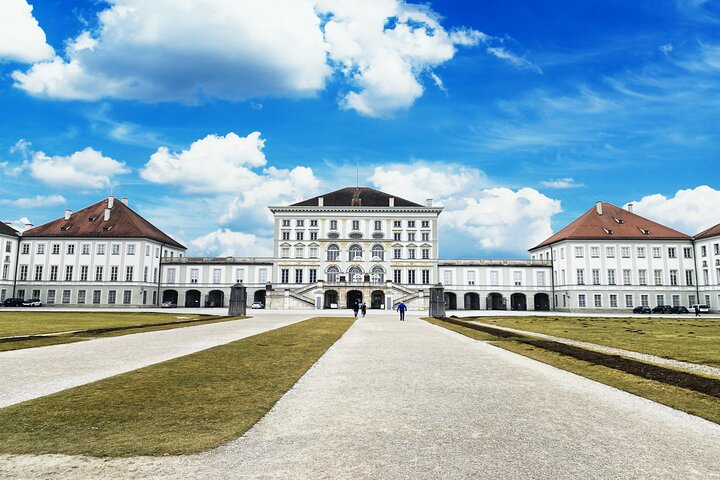 Explore the stunning Baroque architecture of Nymphenburg Palace and the Marstallmuseum immersing in the rich history of Bavarian royalty while enjoying a guided tour of unique royal carriages.