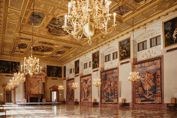 Step into the grandeur of Munich Residenz where ornate chandeliers and stunning tapestries reveal the richness of Bavaria's royal past all guided by a knowledgeable expert.
