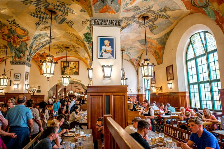 Experience the charm of Munich's beer halls where hearty Bavarian meals and locally brewed beers await inviting you to savor delicious flavors in a historical setting.