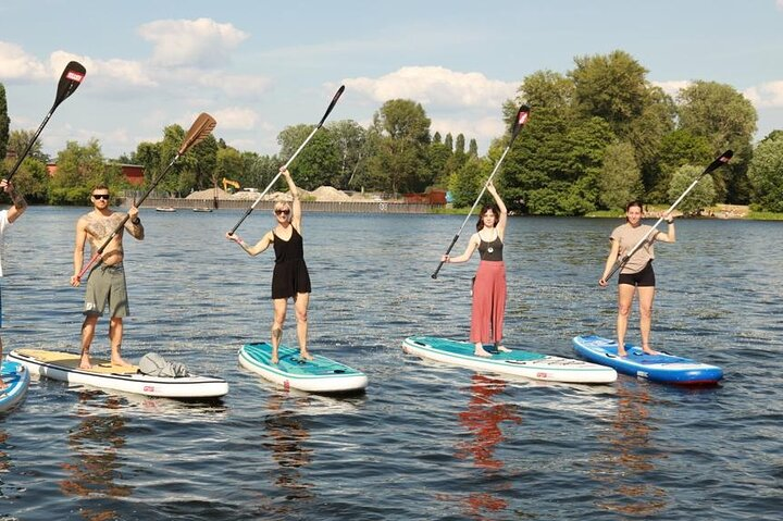 Experience the joy of paddleboarding in Berlin gliding across tranquil waters while connecting with nature and enhancing your paddling skills in a relaxed environment.