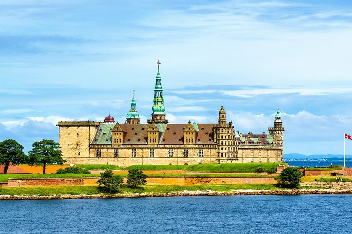 Explore the majestic architecture of Kronborg Castle a stunning example of Danish Renaissance while enjoying scenic views and rich history on a private tour from Copenhagen.