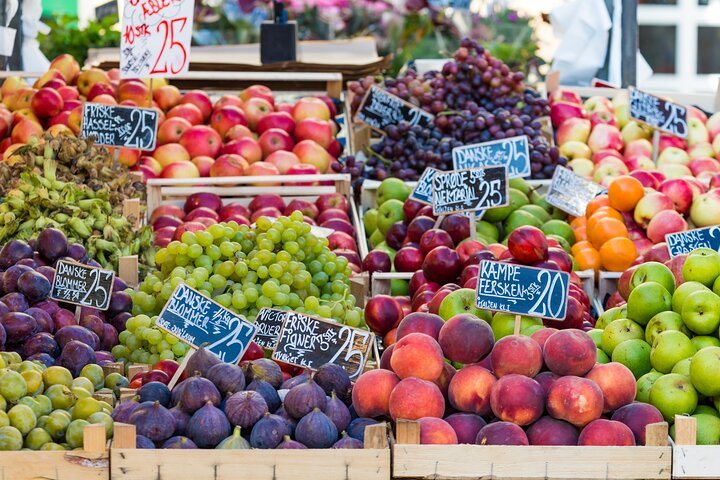 Experience the charm of Copenhagen through its bustling Torvehallerne Market filled with fresh produce and local flavors perfect for culinary exploration and cultural discovery.