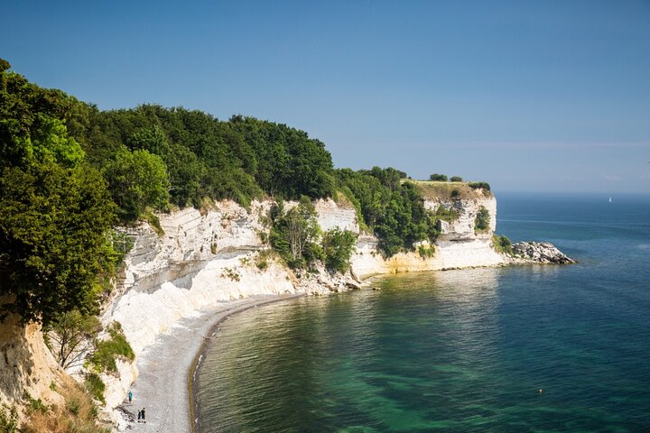 Explore the stunning cliffs of Stevns Klint where ancient history meets breathtaking coastal views offering a unique glimpse into Earth’s prehistoric past just a drive away from Copenhagen.