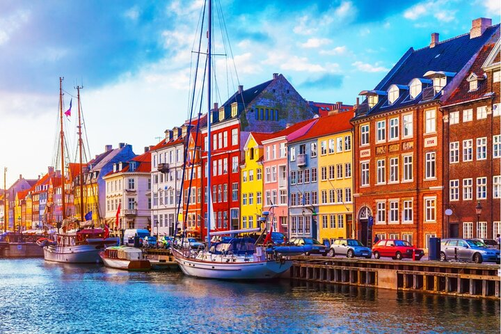 Explore Copenhagen's colorful waterfront while unraveling stories from the Little Mermaid. Solve clues and roam past historic sites immersing in Hans Christian Andersen's magical tales at your own pace.