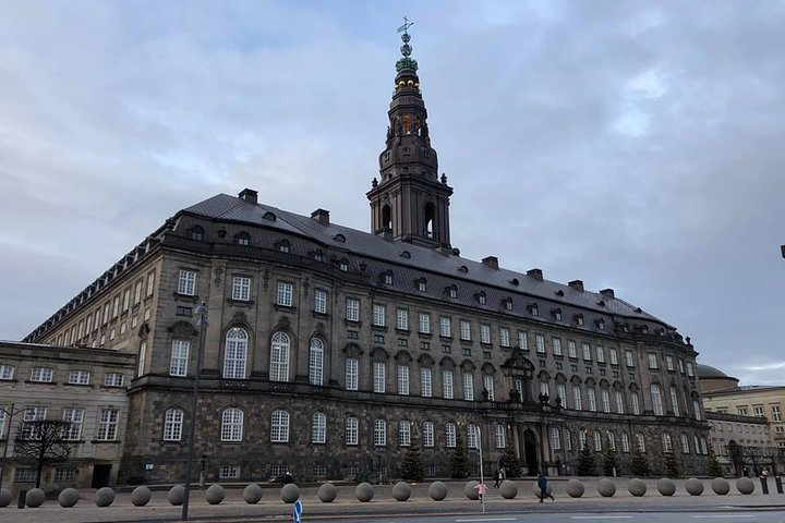 Explore Copenhagen's historic streets and uncover hidden gems ending at Christiansborg Palace where history meets elegance in the halls of Danish governance and royal heritage.