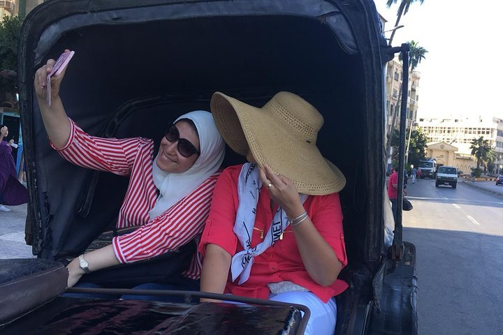 Enjoying a horse carriage ride in the beautiful port city of Alexandria.