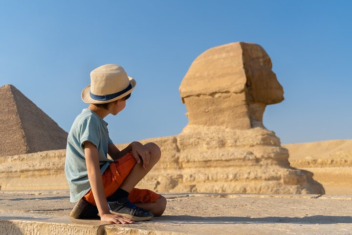 Child looking at Sphinx