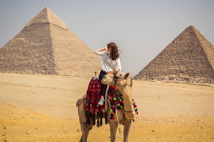 Half-Day Trip to Giza Pyramids and Sphinx with 30 M Camel-Riding - Photo 1 of 11