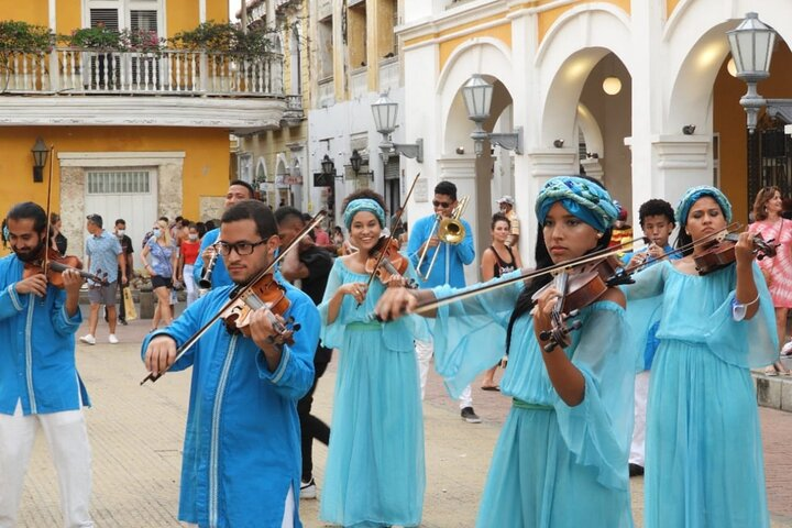 be part of the show, singing, dancing, playing or directing the orchestra!