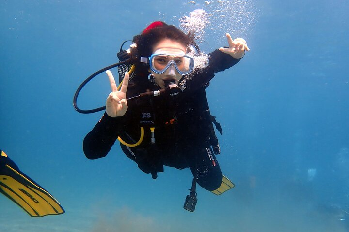 Scuba Diving in Tenerife. Happy Divers Underwater