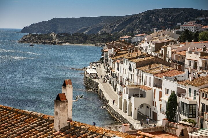 Experience the coastal charm of Cadaqués with its stunning white-washed buildings lining the shore and breathtaking views of the Mediterranean Sea perfect for a memorable day in Catalonia.