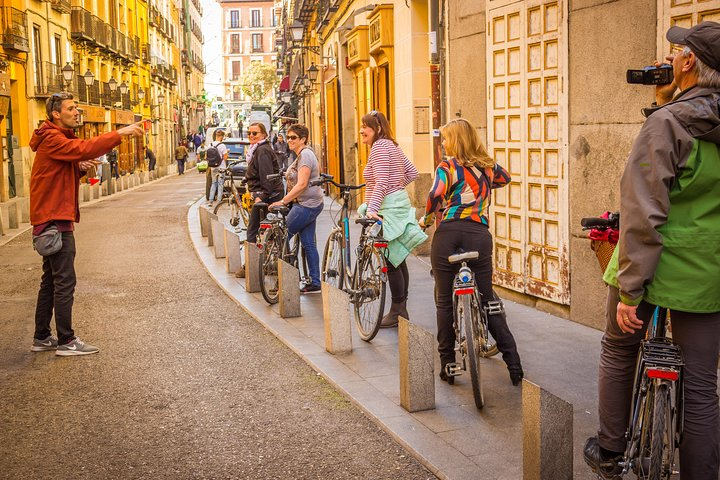 Experience Madrid on two wheels exploring hidden gems and lively streets. Join fellow travelers to savor local flavors and engage with a knowledgeable guide creating unforgettable memories.