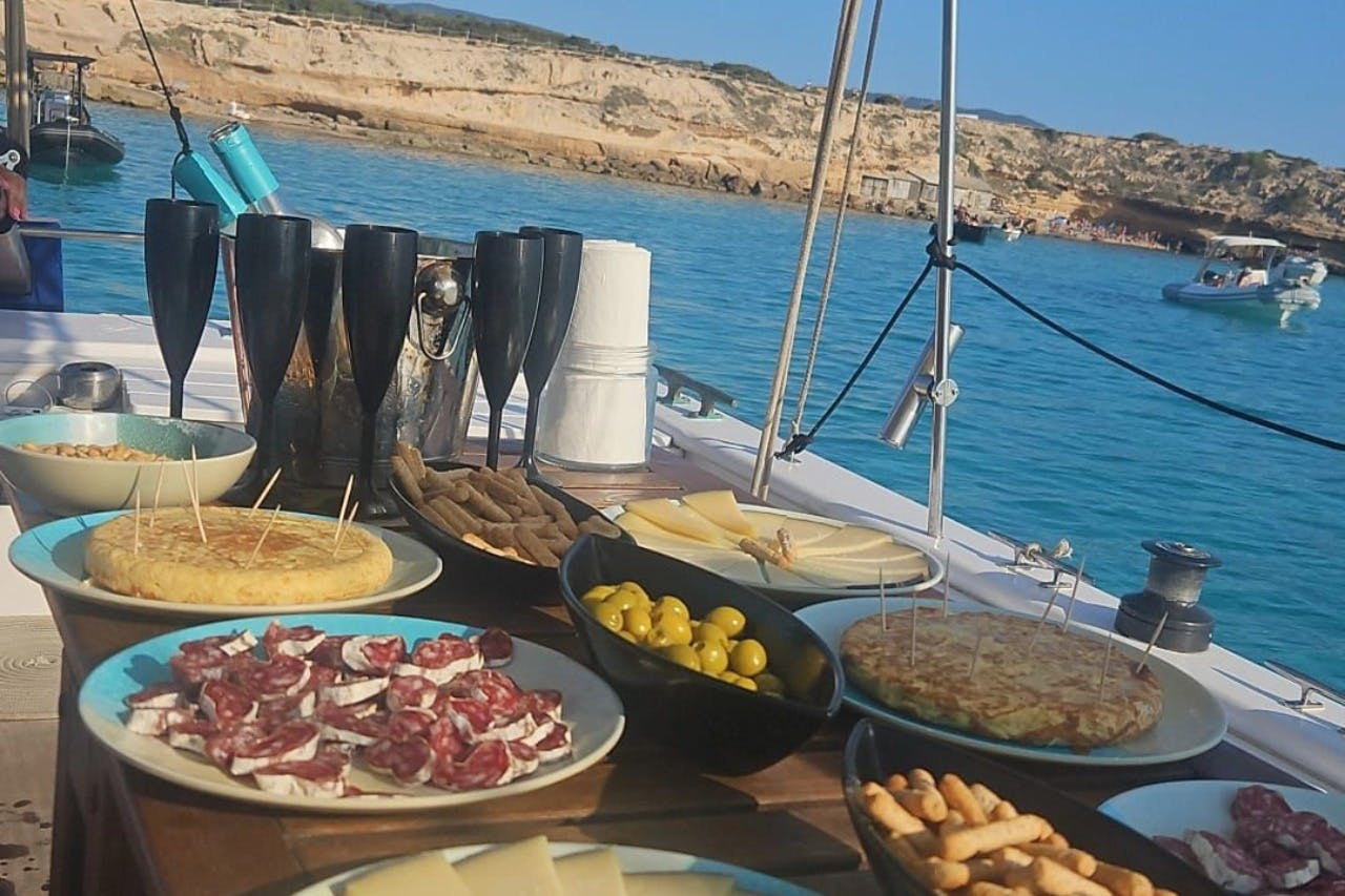 Ibiza: Boat Trip with Banana Boat, Food & Premium Open Bar - Photo 1 of 5