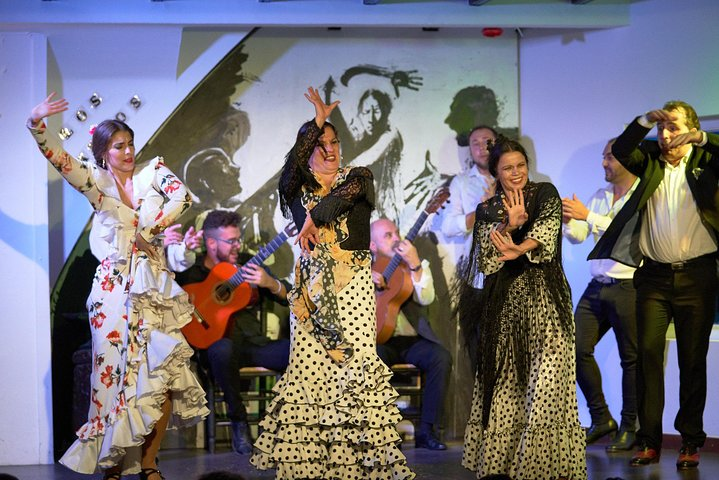 Witness the passion of flamenco as talented artists take the stage in Seville’s Santa Cruz. Experience the rhythm and elegance of a live performance like no other.