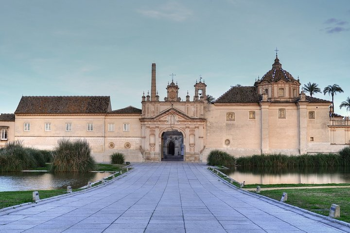 Discover the historical layers of the Monastery of La Cartuja where the banks of the Guadalquivir River meet centuries of rich heritage and artistic expression inviting exploration and reflection.