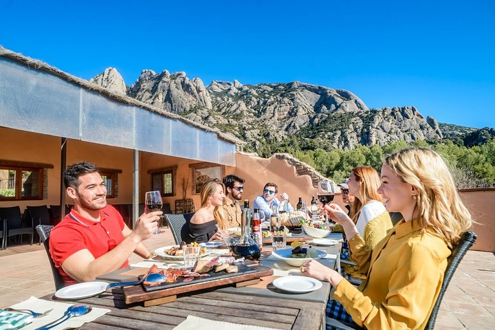 Savor a delightful meal with friends against the stunning backdrop of Montserrat creating lasting memories in the serene countryside just outside Barcelona. Ideal for nature lovers and culture enthusiasts alike.