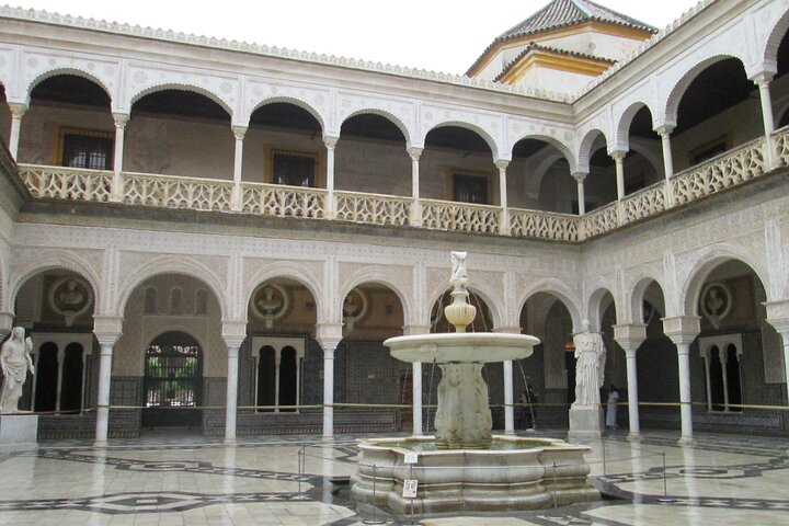 Step into a realm of history and hidden magic at Pilate's House where exquisite architecture meets captivating legends revealing Seville's rich cultural tapestry within its tranquil courtyards.