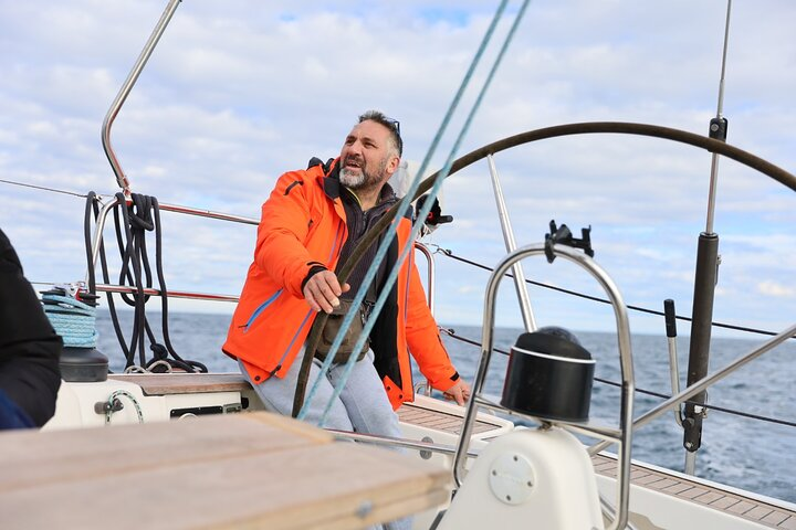 Learning to take the helm of the boat