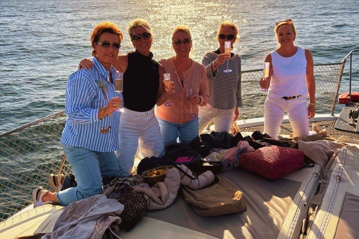 Dolphin Searching Sunset Cruise with Bottle of Cava & Snacks - Photo 1 of 25