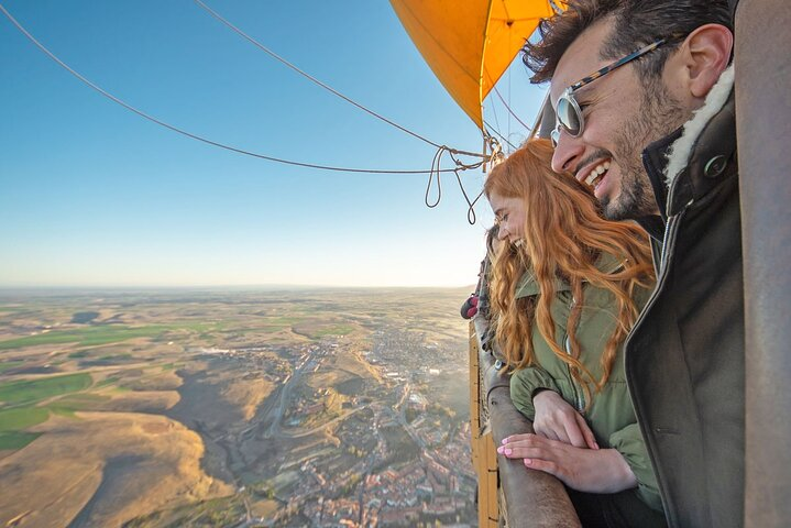 Experience Segovia's stunning landscapes from above as you float along with the breeze sharing laughter and glasses of cava with friends. A journey to cherish forever.