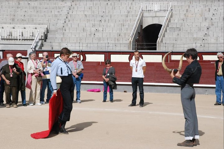 Experience the art of bullfighting in Madrid as students showcase their training demonstrating techniques with capes and crutches all within the historic bullring. An educational journey awaits!