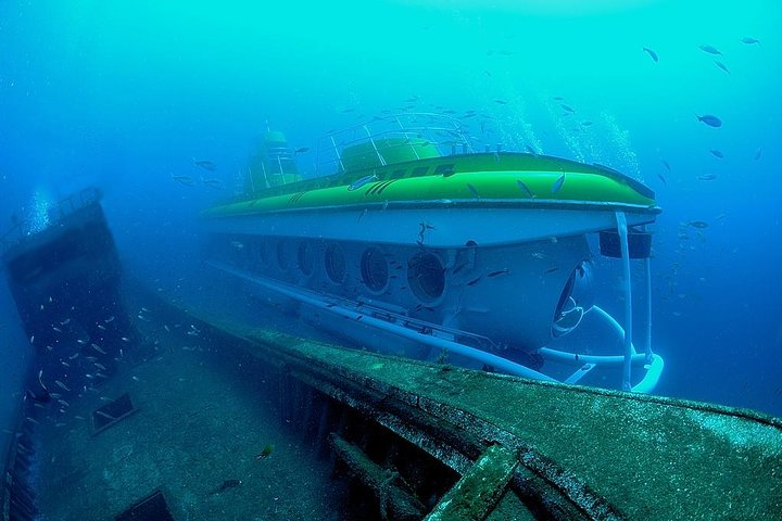 Submarine Safaris at 25m passing one of the wrecks