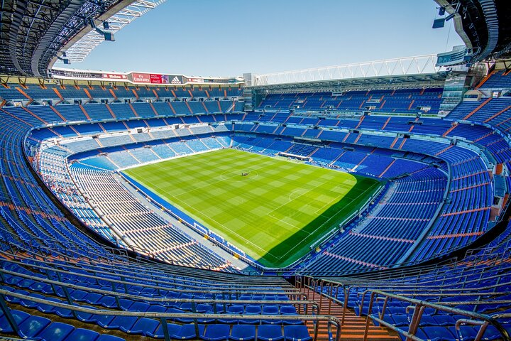 Experience the iconic Santiago Bernabeu Stadium home to Real Madrid where history echoes through the seats and the passion for football fills the air. Explore legendary trophies and unforgettable moments.