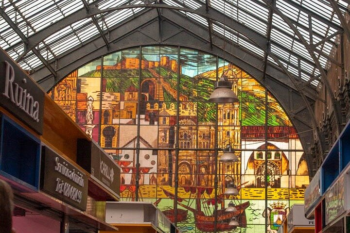 Later stained glass windows of the popular Atarazanas Market from its interior
