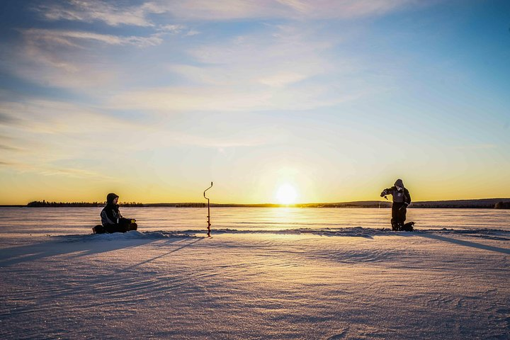 Ice Fishing Tour on a Frozen Lake in Rovaniemi - Photo 1 of 14