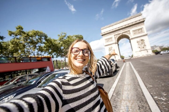 Experience stunning views of Paris while exploring the iconic Arc de Triomphe complemented by a relaxing Seine River cruise showcasing the city's famous landmarks from a unique perspective.