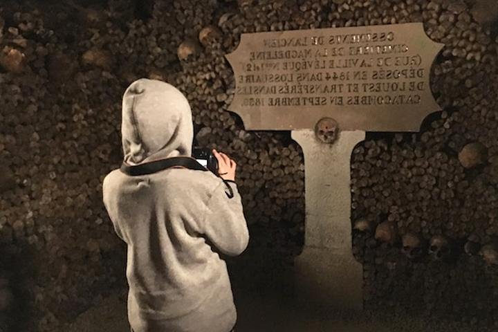 kid in paris catacombs