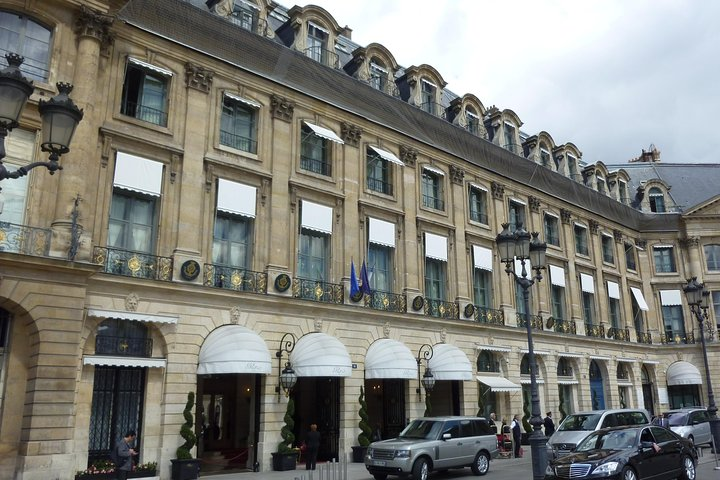 Remember Audrey arriving at the Ritz in a nightgown, raincoat, and rubber boots? Name that movie!