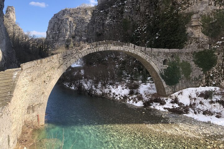 Feel the charm of ancient stone bridges and crystal-clear waters in the hidden villages of Zagorochoria where history and nature blend seamlessly inviting exploration and discovery.