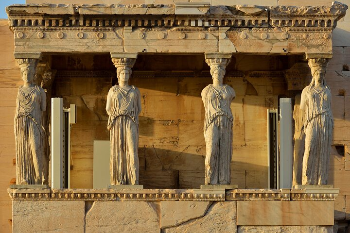 Discover the stunning details of the Acropolis as the sun casts golden hues over ancient stone providing perfect photo opportunities and a glimpse into Athens' rich history.