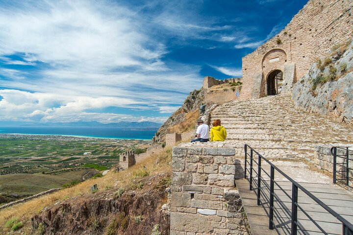 Experience the rich history of Ancient Corinth as you stroll along its storied pathways soaking in breathtaking views and reflecting on the footsteps of great conquerors and Saint Paul.