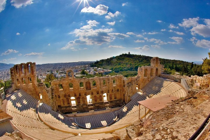 Discover the grandeur of the Odeon of Herodes Atticus! Your guide will share the history of this ancient theater, still hosting performances today.